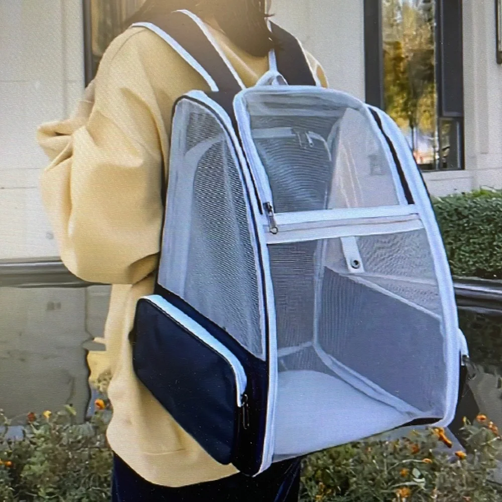 Pet carrier backpack for dogs and cats.